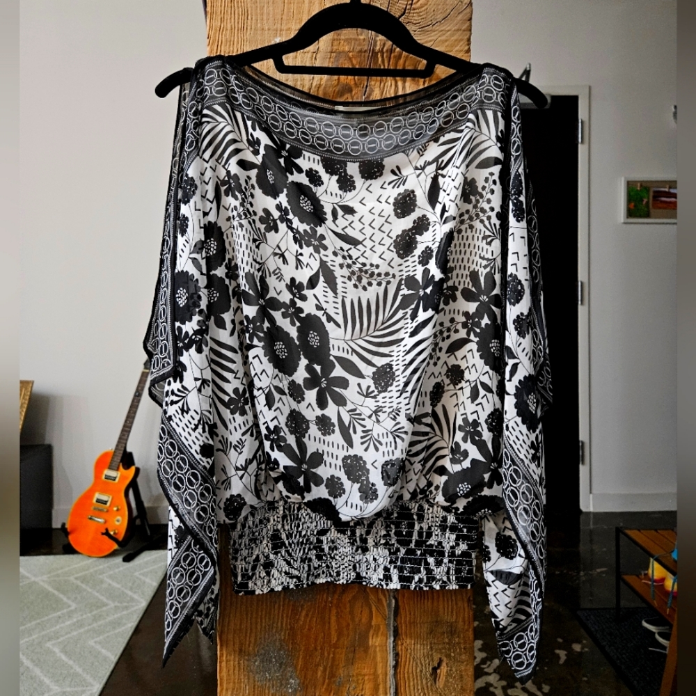 Sleeveless flowy top